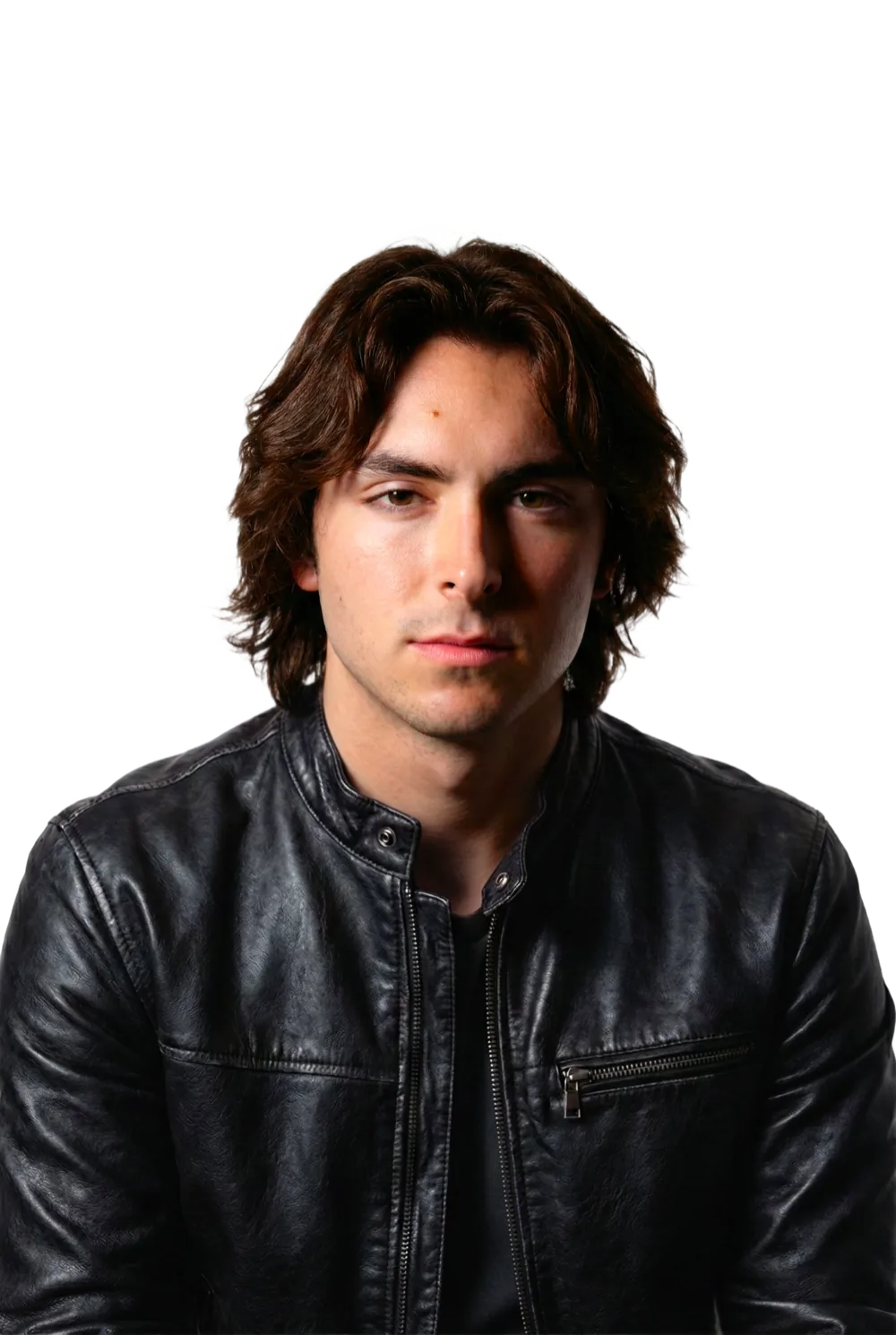 Matthew Kenney, shot against black in a black leather jacket.